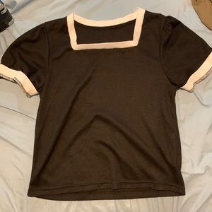 Medium black shirt with white trim